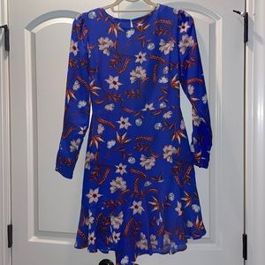 Long sleeve mini dress: asymmetrical slit in hem.